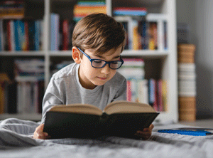 boy reading at home